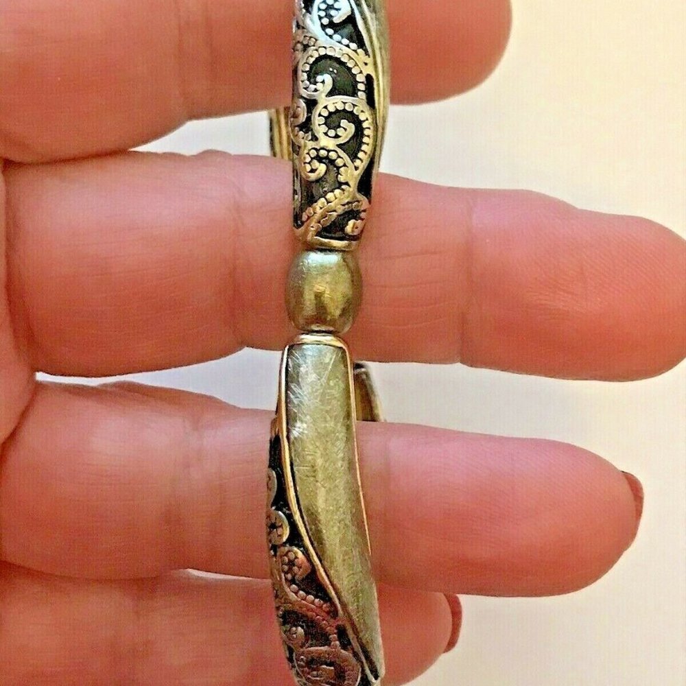 COSTUME BRASS TONE & BLACK FILIGREE SCROLL STRETCH METAL BRACELET